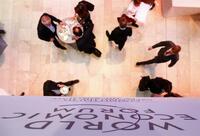 ダボス会議を襲った､新興市場の混乱 世界経済のリスク浮き彫り