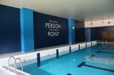 プール壁面には学校理念“The Whole Person, The Whole Point”と記されている