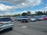 駐車場では痛車がずらりと並んでいた