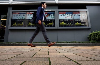 Japan's Nikkei dips, on track for first annual loss since 2011