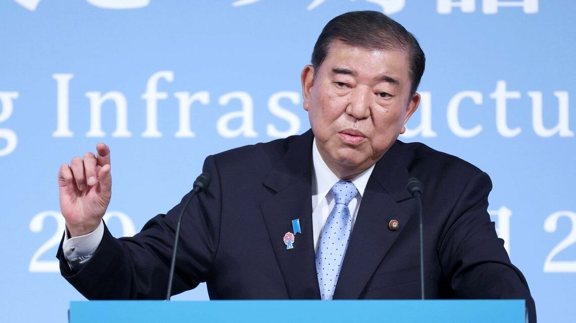 民間の政策提言組織「令和国民会議」で講演する石破茂首相。誰が敵で誰が味方かわからない、さながら「人狼ゲーム」のような状況の中で参院選に突入することになる（写真：時事）