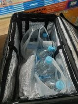 2リットルの水4本＋牛乳1本。ベビー級の配達でも報酬は変わらないから泣けてくる（著者撮影） 