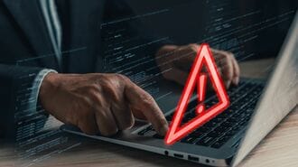 サイバー攻撃を受ける会社員