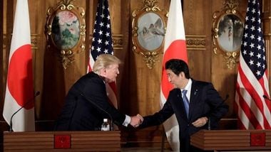 In Florida, Dark Clouds Cover The Abe-Trump Summit