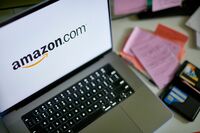 アマゾン､法人顧客向けAIチャットボット｢Q｣発表 競合がリードする分野で地歩を固めたい考え