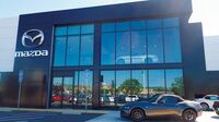 マツダが｢脱･値引き｣米国で高級感の新店舗 国内縮小で､販売の8割占める海外に活路探る
