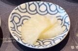 「18品の朝ごはん」築地吉岡屋のべったら漬け。あっさりした甘さの大根のお漬物（筆者撮影）