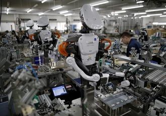 Analysis - Desperately short of labor, mid-sized Japanese firms plan to buy robots