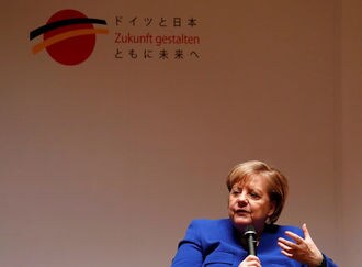 メルケル首相､ファーウェイの5G網構築に条件