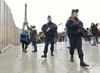 France Vows Merciless Response After Attacks Kill 129