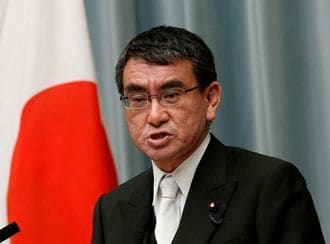 Japan urges pressure on N.Korea, military to seek record defence spending