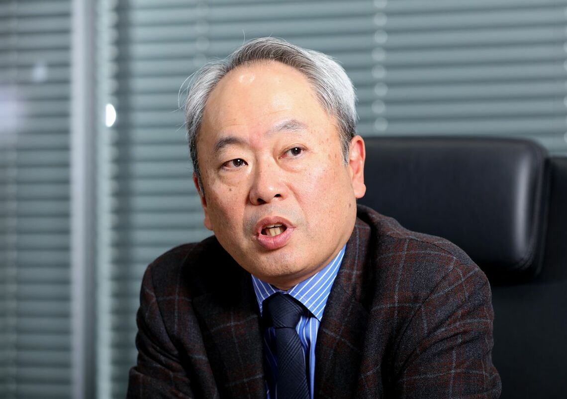 とやま・かずひこ/1960年生まれ。ボストン コンサルティング グループ、産業再生機構などを経て2007年に経営共創基盤を設立、現職に（撮影：尾形文繁）