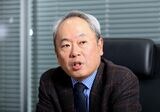 とやま・かずひこ/1960年生まれ。ボストン コンサルティング グループ、産業再生機構などを経て2007年に経営共創基盤を設立、現職に（撮影：尾形文繁）