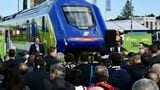 2022年の国際鉄道見本市（イノトランス）会場で行われた、日立がイタリア向けに製造した車両「ブルース」の引き渡し式（記者撮影）