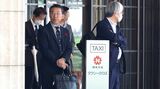 「残念ですね」と言い残し、株主総会の会場から立ち去るシティインデックスイレブンスの福島代表（撮影：尾形文繁）