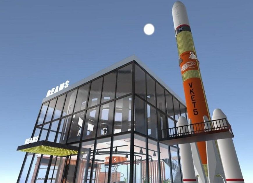 バーチャルマーケット5で使われたバーシャルショップの全景。開放感のあるガラス張りの建物の横には巨大なロケットが展示されており、ランドマークとしても目立っていた（画像：ビームス）