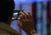 １ドル104円台後半、日経平均は急伸 年金運用積極論者・塩崎氏の入閣報道手掛かり