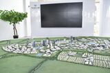 KCIC本社に設置された、各駅の周辺開発を示す巨大な都市模型。写真はテガルアール周辺（筆者撮影）