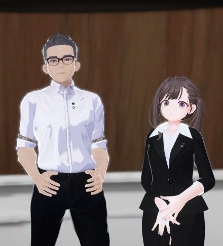 日産自動車日本事業広報渉外部の遠藤和志氏（左）と鵜飼春菜氏。3D CGで作られたアバターだが、身振り、手振りがあるために実体感が強い（筆者撮影）