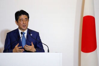 Japan's Abe points to 2008 crisis as G7 leaders debate global risk