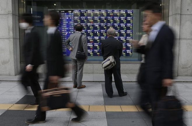 日経平均4日続落、1万4006円で終了