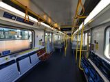 メトロの「HCMT」車内はセミクロスシートとなった（筆者撮影）