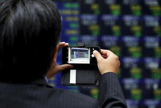 前場の日経平均続伸､アップル関連など堅調