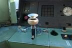 主幹制御器（マスコン）を左手で操作する