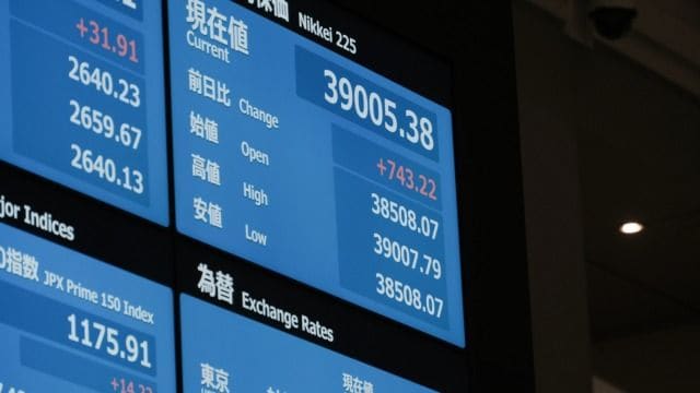 2月22日、日経平均株価が34年ぶりに史上最高値を更新した（写真：Bloomberg）