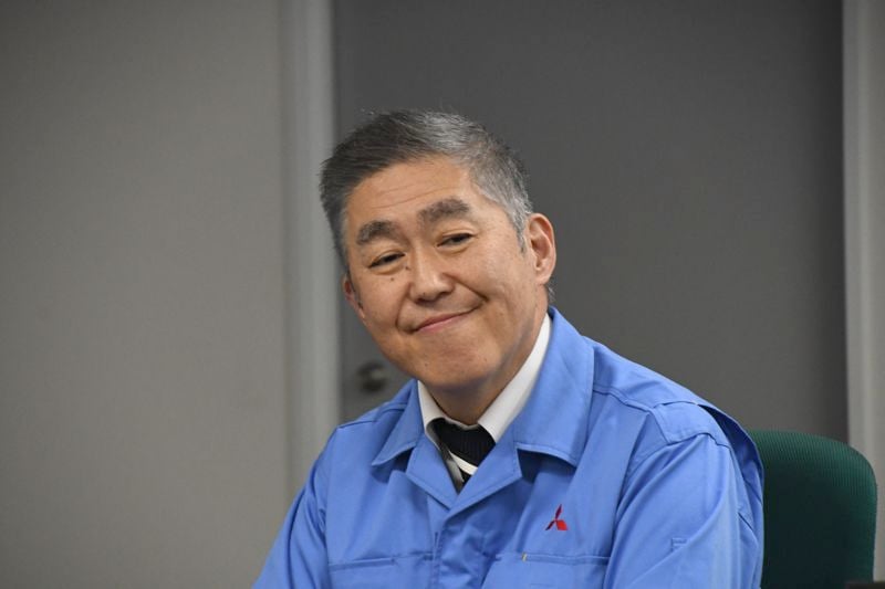 三菱重工の新交通システムを所管するGXセグメントの藤岡健治セグメント長代理（記者撮影）