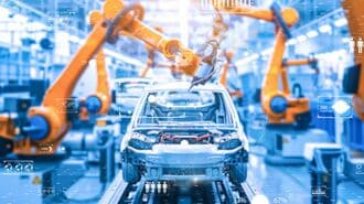 自動車を組み立てるロボット