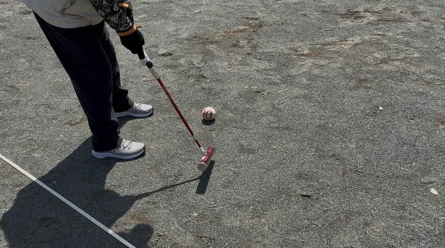 筆者を介護プレイしてくれた会長の正確無比な一打（写真：筆者撮影）