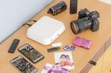 スマホはもちろん、デジカメ、ビデオカメラ、紙の写真（別途スキャナーが必要）…など、さまざまな写真を取り込んで、一括管理し、リビングのテレビで閲覧できる（写真：バッファロー）