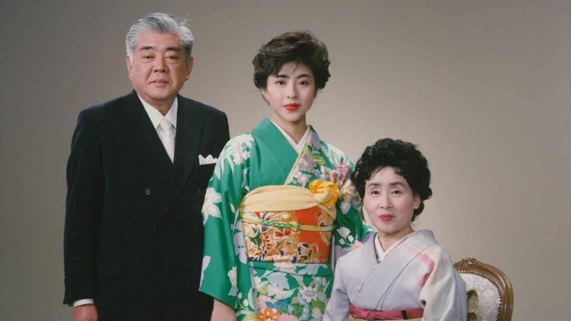 松本明子さんとご両親の思い出の写真