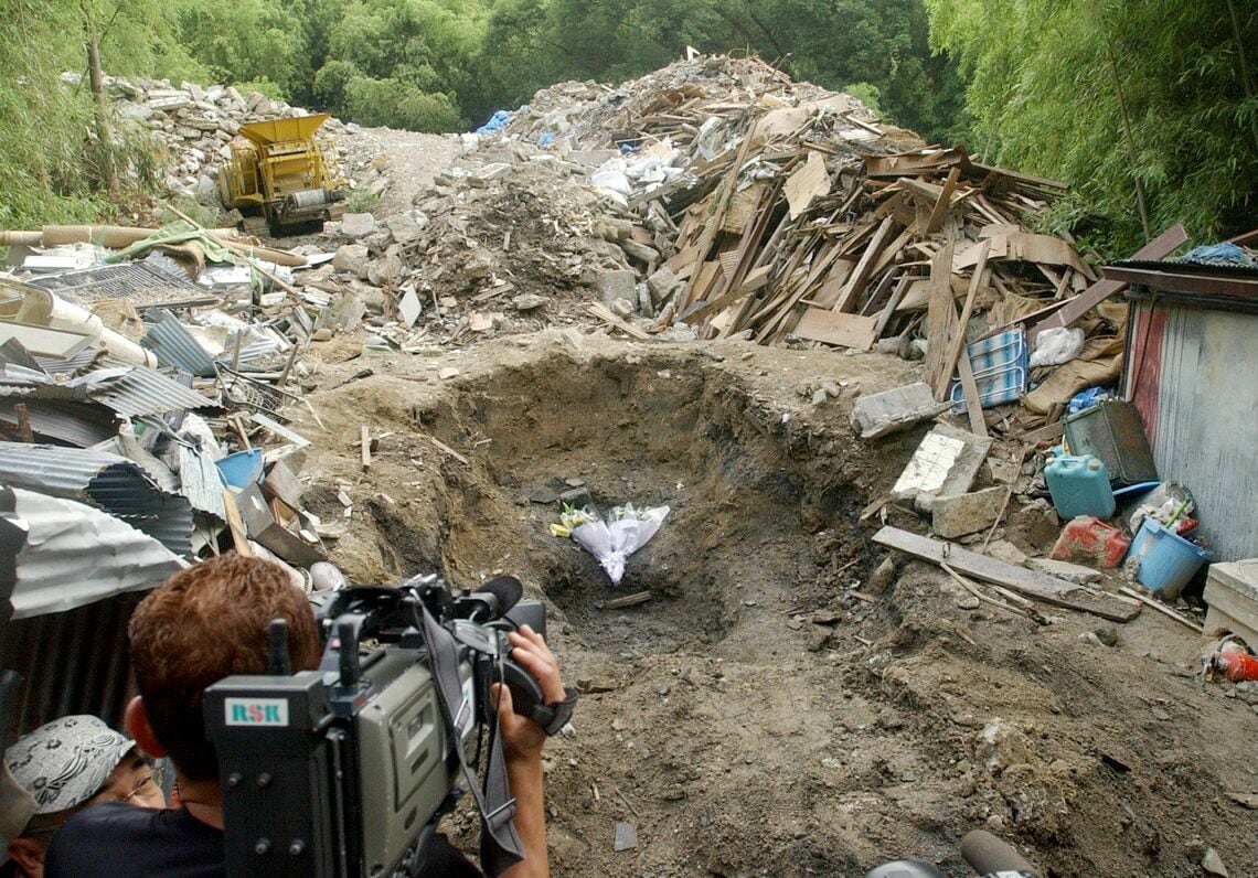 被害者の遺体が見つかった岡山市内の産廃集積場（写真：時事）