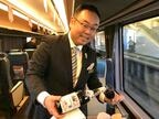車内でサーブするソムリエ小牧氏