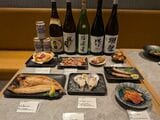 白金水産の展示。日本酒の存在感がすごい（筆者撮影）
