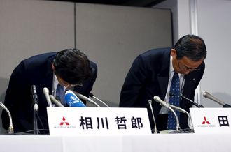 Mitsubishi Motors says Japan orders halved; chief says no plans to resign