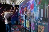 VRヘッドセットを装着しなくてもアバターとのコミュニケーションを楽しめたブースは、ひときわ人気だった（筆者撮影）