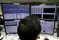日経平均4日ぶり反落､配当落ち分埋めきれず 米ナスダック急落受け､ハイテク銘柄が下落