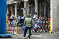 ゼロコロナ政策は揺るがないと衛生当局者語る 生産拠点に対するロックダウン緩和の期待くじく