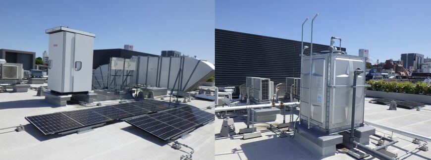 BRANZマンションシリーズの屋上に設置された「ソーラー蓄電システム」（左）と、「屋内消火栓」用の「屋上補給水槽」（右）。入居者は、こういった設備一つひとつについて、資料を基に説明を受けることができる