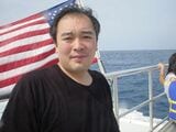 2004年11月。会社員時代にグアム島での写真。体重105kgの肥満体。何者かになりたかったけどなれなかった時代（写真：立花さん提供）