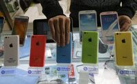 中国でアップルとサムスンに明暗 焦点:モバイル市場に「中国サプライズ」