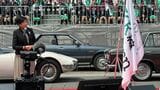 トヨタ「2000GT」など日本の名車の前で挨拶をする小池百合子東京都知事（筆者撮影）