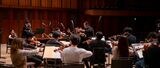 JNOのオーケストラで指揮者としてリハーサルを行う様子（写真：Kenryou Gu）