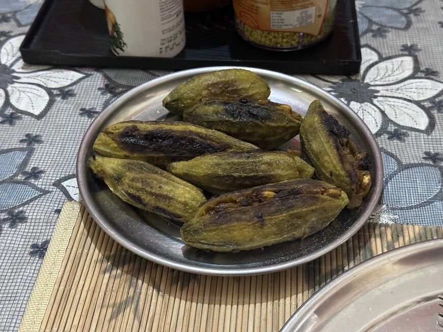 インドの家庭料理、Bさん宅のバルワカレラ。ゴーヤの苦さとスパイシーさが魅力（写真：八木さん提供）