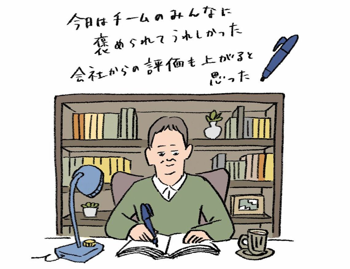 ノートに書き込む男性