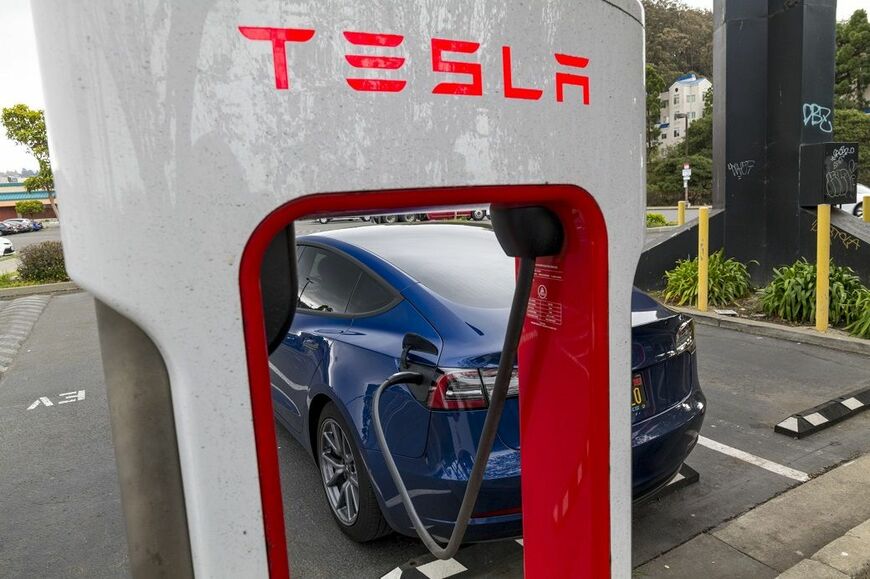 単なるEVメーカーと侮っていると本質を見誤る（写真：David Paul Morris／Bloomberg）