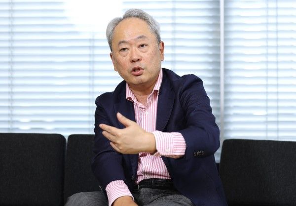 冨山和彦（とやま かずひこ）／経営共創基盤（IGPI）グループ会長。1960年東京都生まれ。東京大学法学部卒業、スタンフォード大学MBA、司法試験合格。ボストンコンサルティンググループ、コーポレイトディレクション代表取締役を経て、2003年に産業再生機構設立時に参画しCOOに就任。2007 年の解散後、IGPIを設立。2020年10月より現職。共著に『2025年日本経済再生戦略』などがある（撮影：尾形文繁）